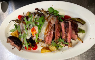 Nando Milano Trattoria signature dishes Tagliata Di Manzo
Rigatoni Alla Beppe
Ravioli Di Zucca